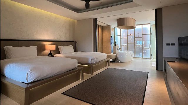 The Ritz-Carlton, Koh Samui Schlafzimmer mit zwei Einzelbetten