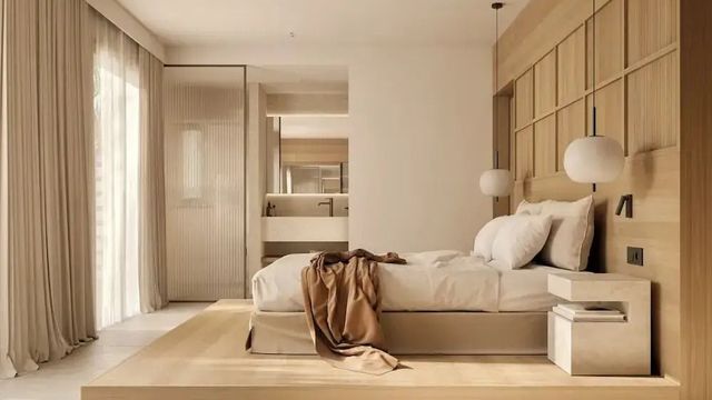 Elegantes Schlafzimmer mit modernen Möbeln und natürlichem Licht