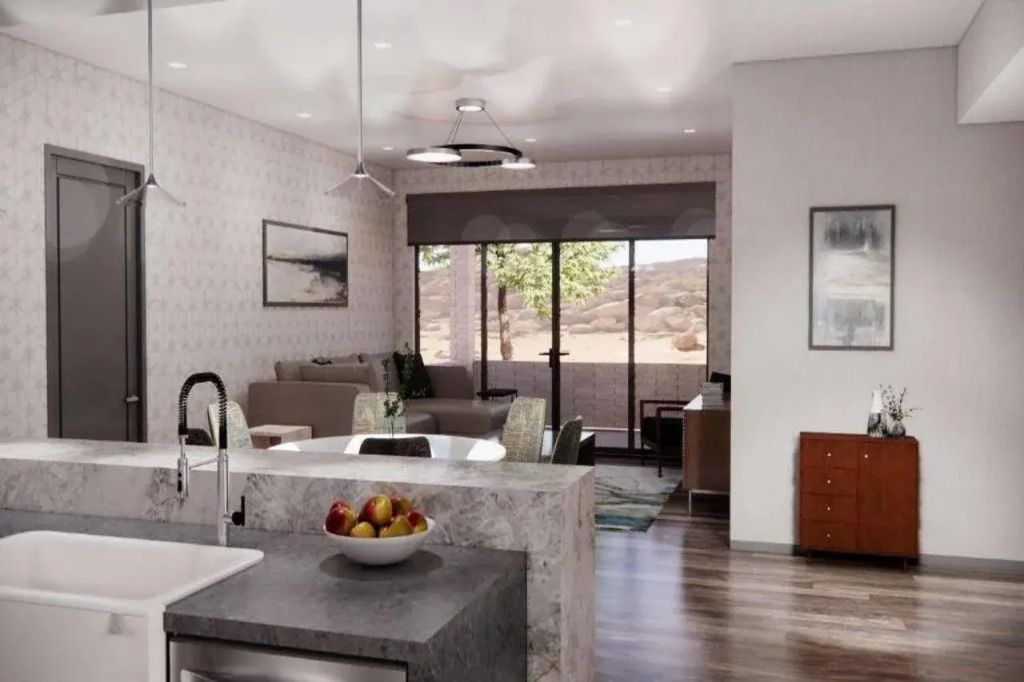 Elegante Suite mit moderner Küche und Blick auf die Wüste