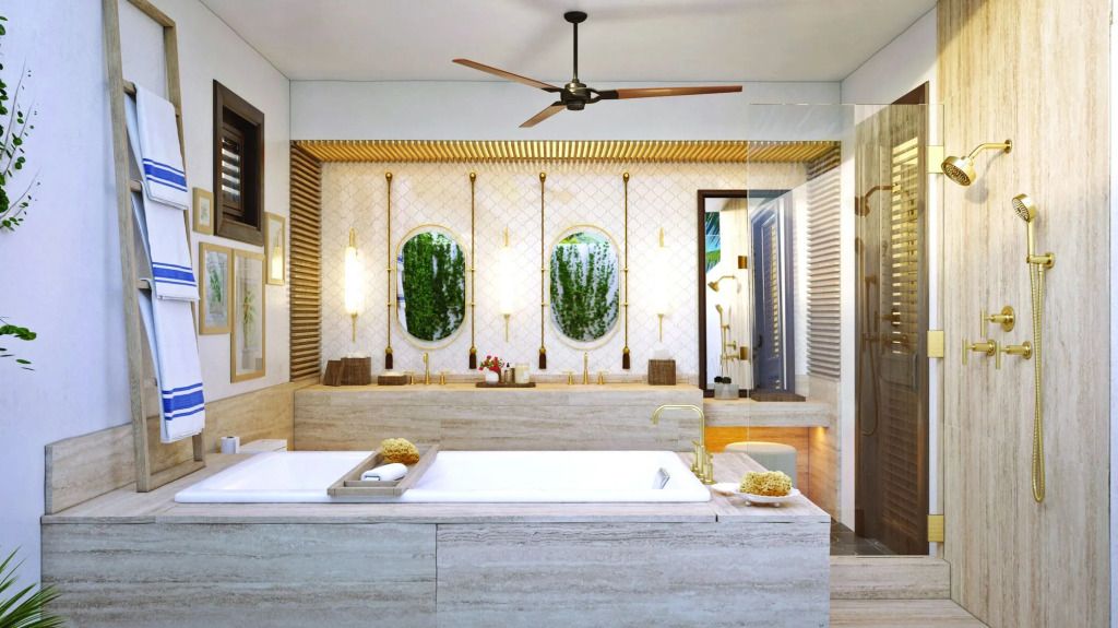 Luxuriöses Badezimmer mit großer Badewanne und eleganten Spiegeln im Cap Juluca Hotel