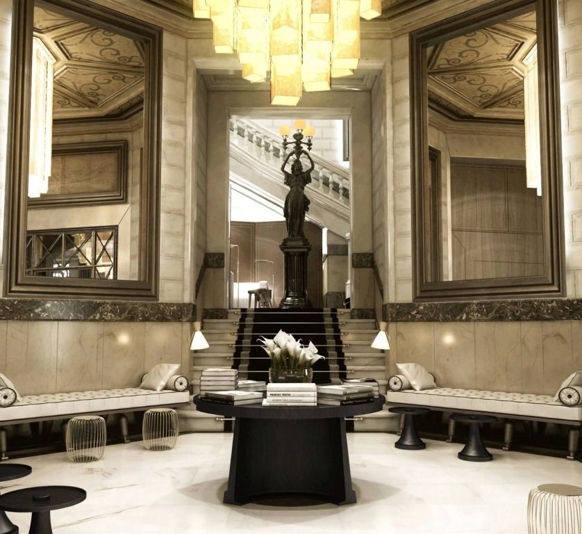 Elegante Hotellobby mit prächtiger Beleuchtung und stilvollen Sitzbereichen