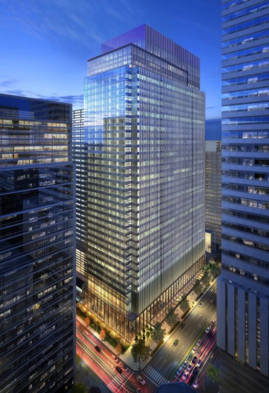 Elegante Glasfassade des Four Seasons Hotel Tokyo bei Nacht erleuchtet