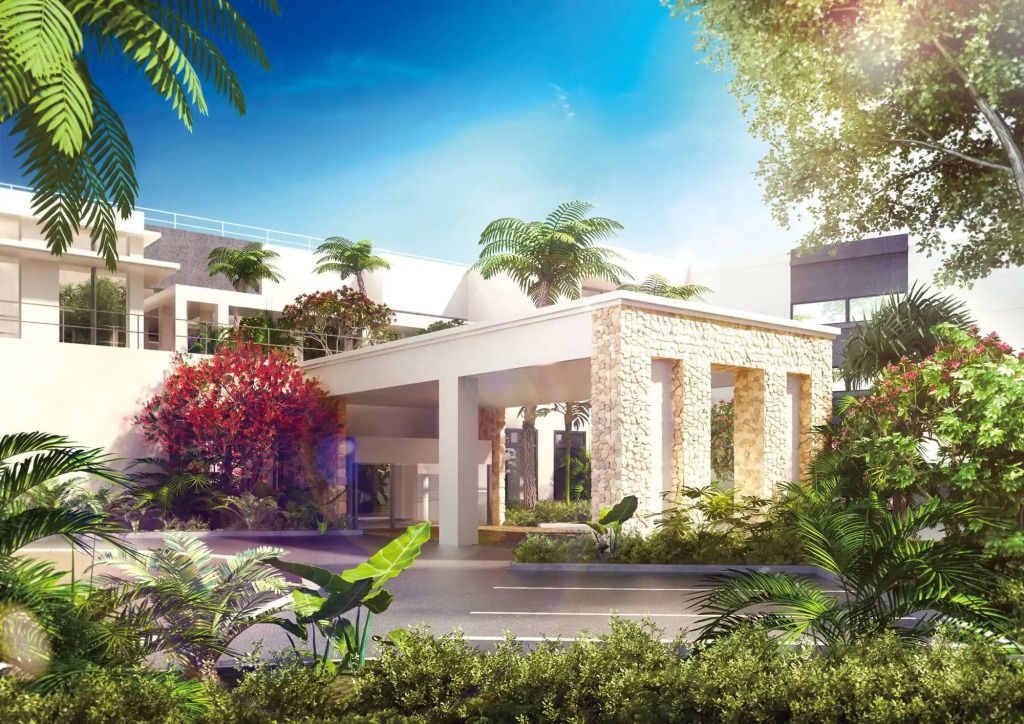 Eleganter Hoteleingang mit üppiger Vegetation und modernem Design.