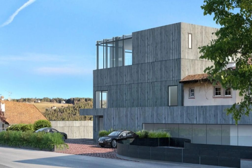 Moderne Hotelarchitektur mit Holzverkleidung und klaren Linien