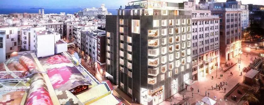 Moderne Hotelarchitektur im Stadtzentrum von Barcelona bei Nacht